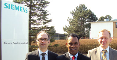 At the Siemens flow equipment manufacturing facilities in Norborg, Denmark: Ryan Chetty with CFO Hajo Nagele (left) and CEO Michael-Lundgard Thompson